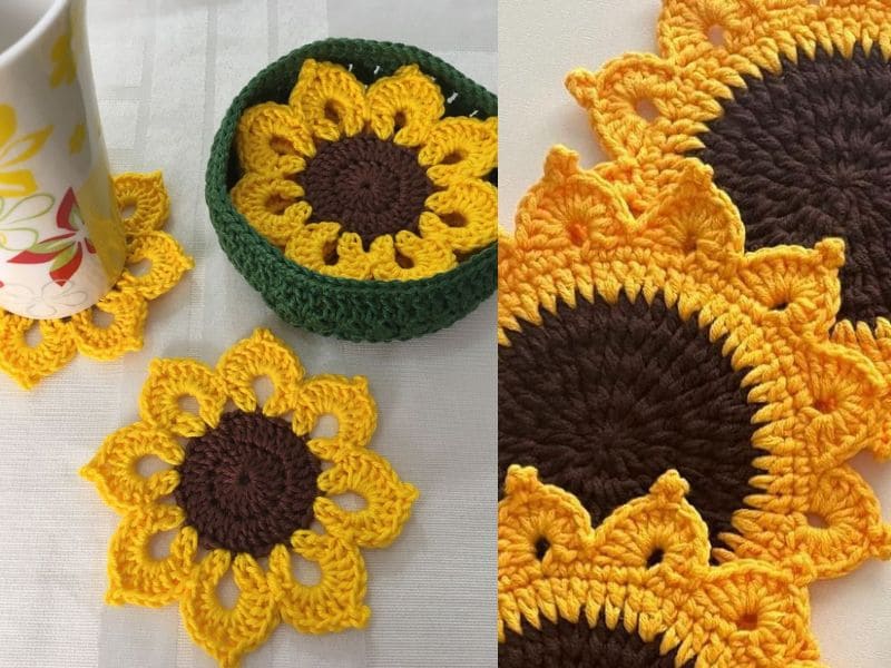 Descanso de copos em crochê com formato de girassol em tons de marrom e amarelo, alguns organizados em um recipiente verde, e uma xícara sobre um deles.